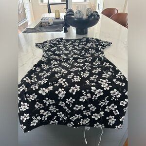 Black multi colored dress with back zip and front pockets